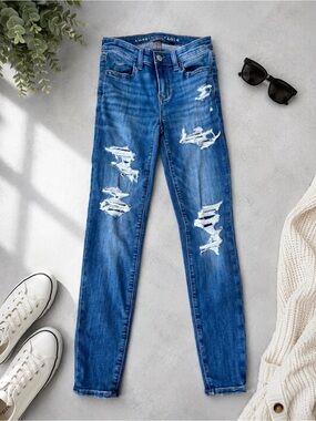Distressed Mid-Blue Women's Skinny Jeans